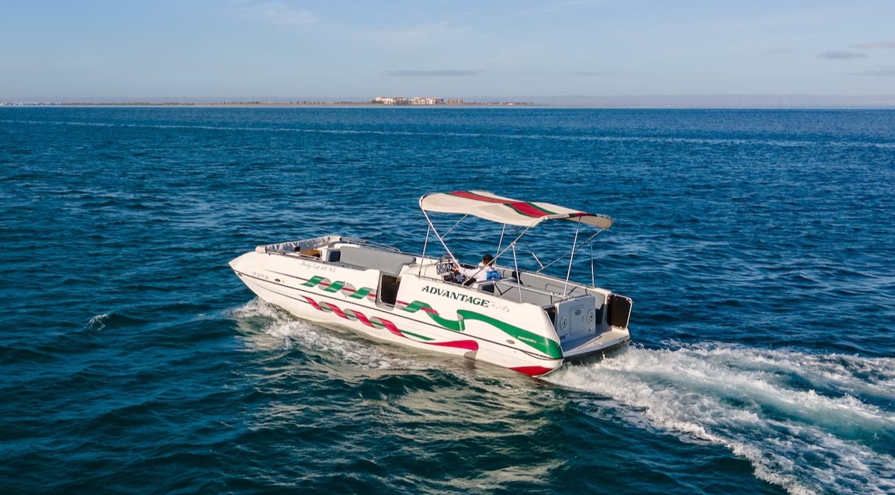 Dreaming of Summer Vacation: ¡Party Cat Deck Boat in La Paz!